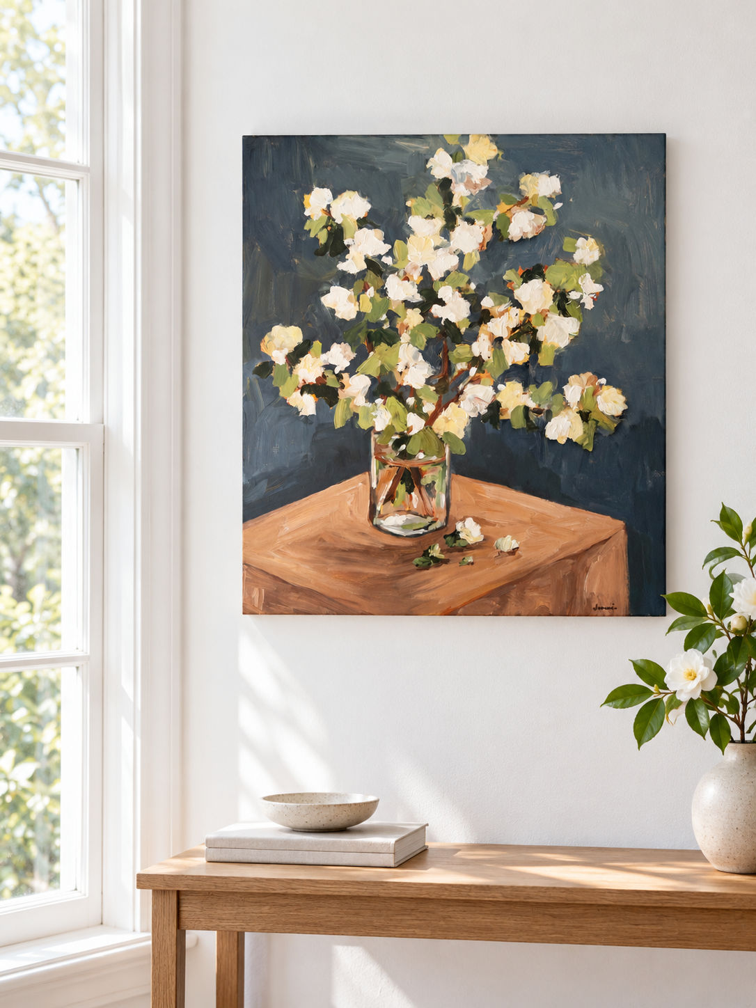 Camellias in a glass vase