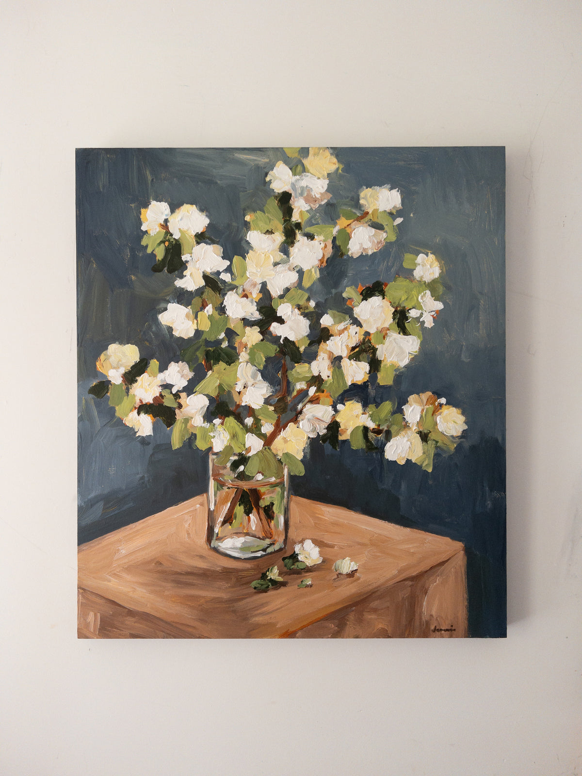 Camellias in a glass vase